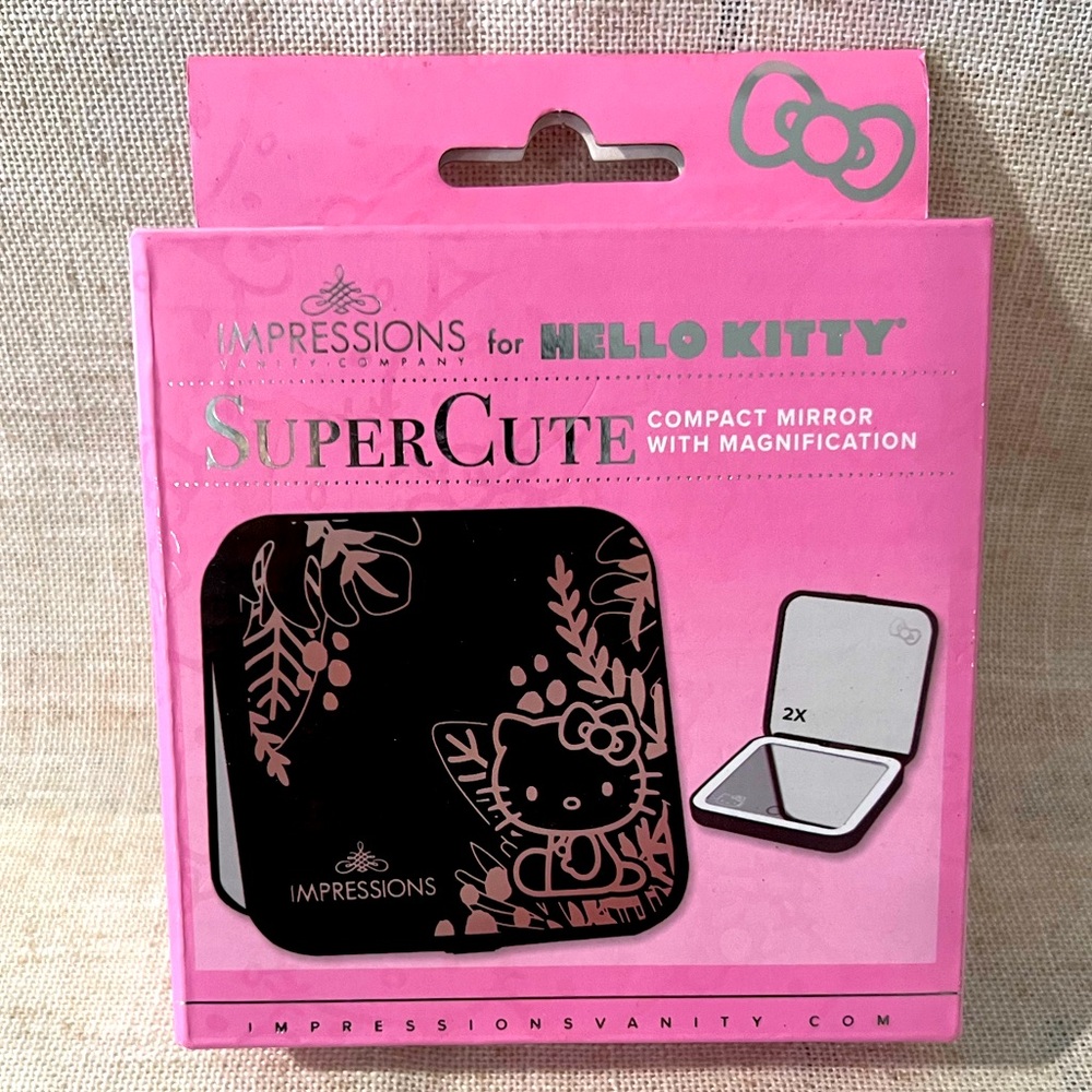 Hello Kitty black mirror with magnification and light from impressions vanity